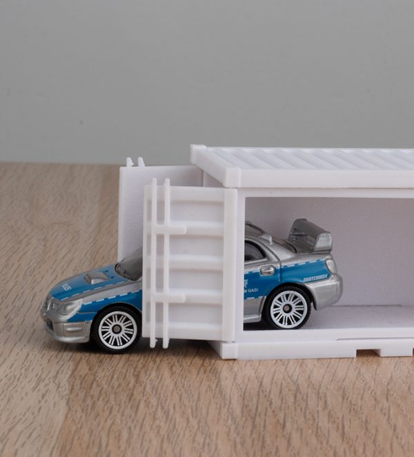 Container de expunere pentru machete auto la scara 1/64, realizat din material rigid, ideal pentru colecții Hot Wheels și Matchbox.